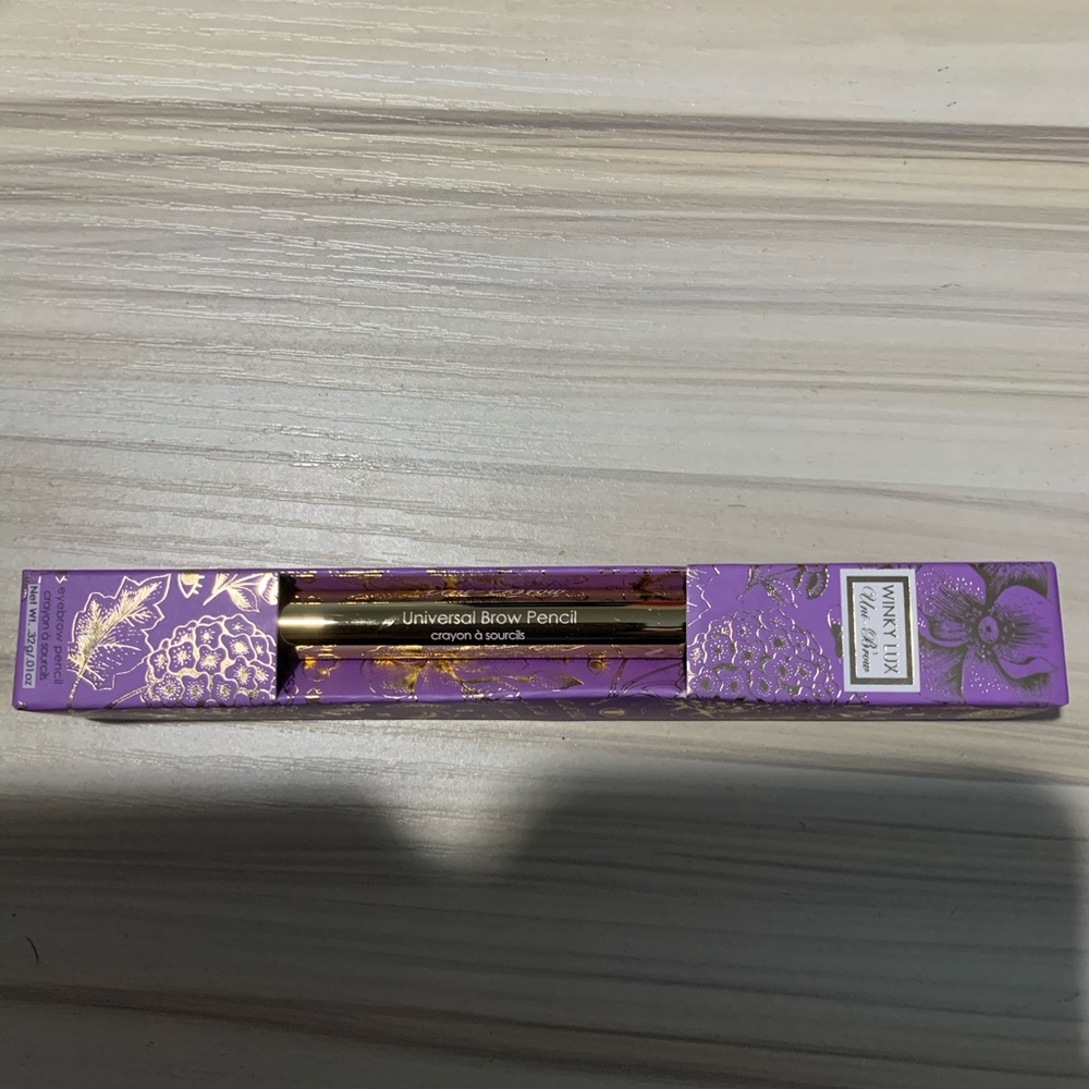 Brand new. Winky Tux uni-Brow Eyebrow pencil